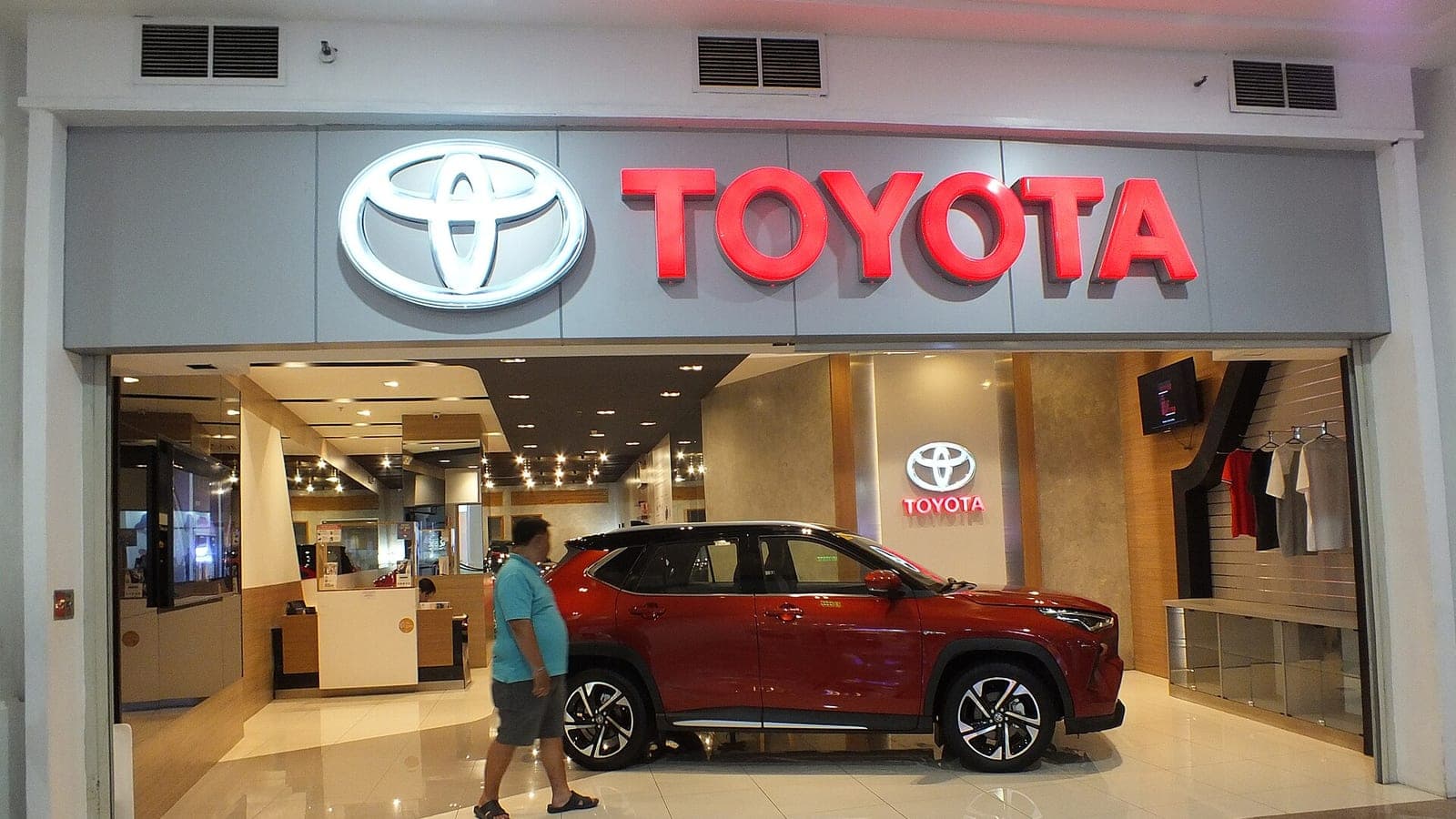 A Toyota dealership showroom at Ayala Center Cebu with a car on display